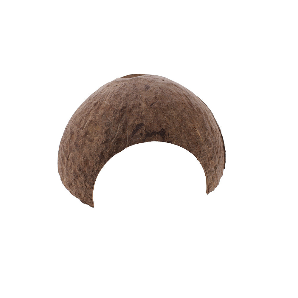Coconut shell cave hideout for geckos and small birds on a terrarium floor