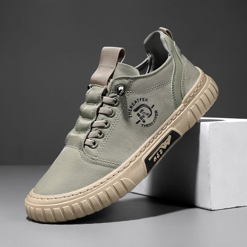 Green lace up canvas sneaker with flat laces and a beige ribbed sole, leaning on a white block, size EU 41 option