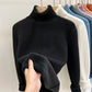 Black high collar fleece lined knit sweater, size M option, shown on a hanger