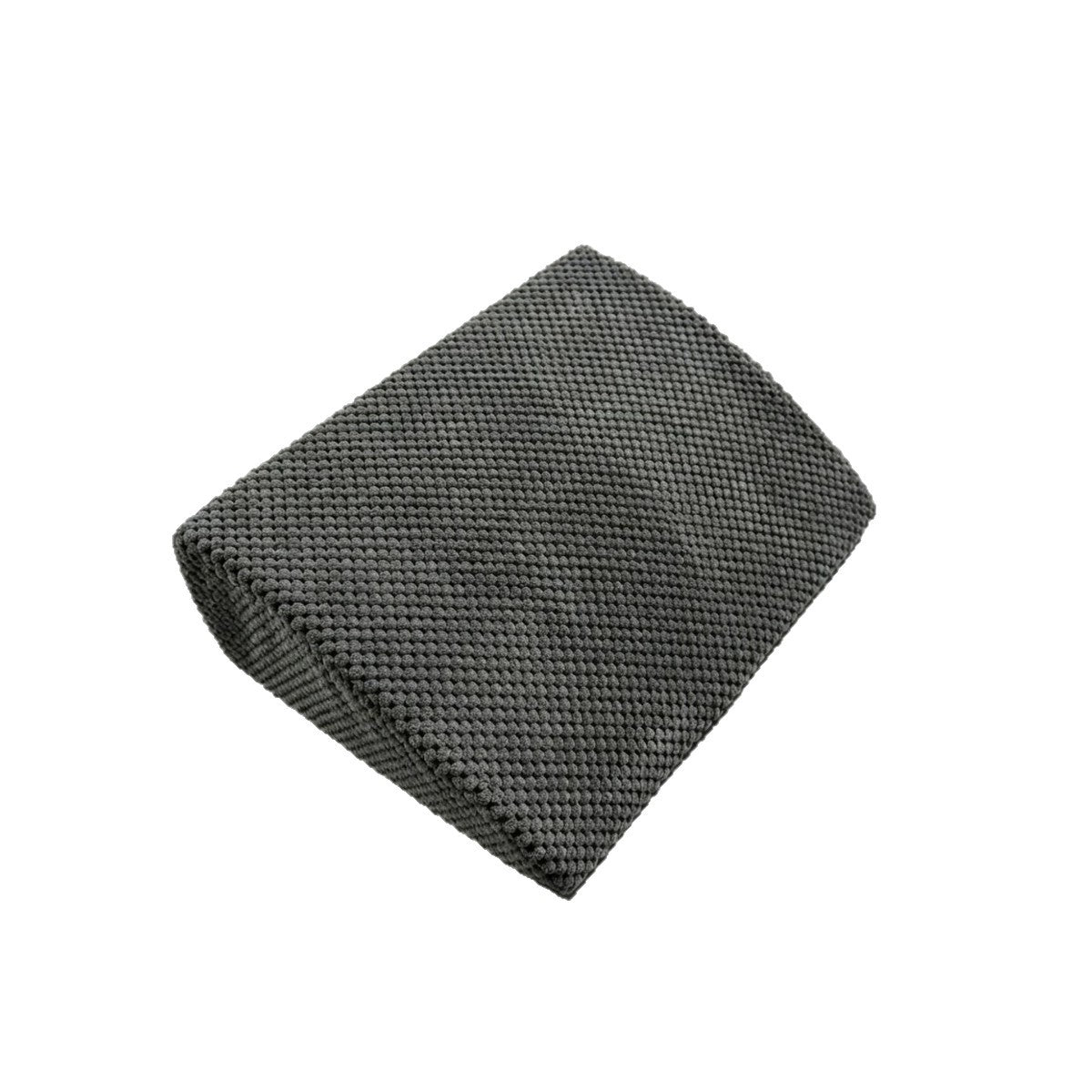 Single gray textured foam wedge step on a white background