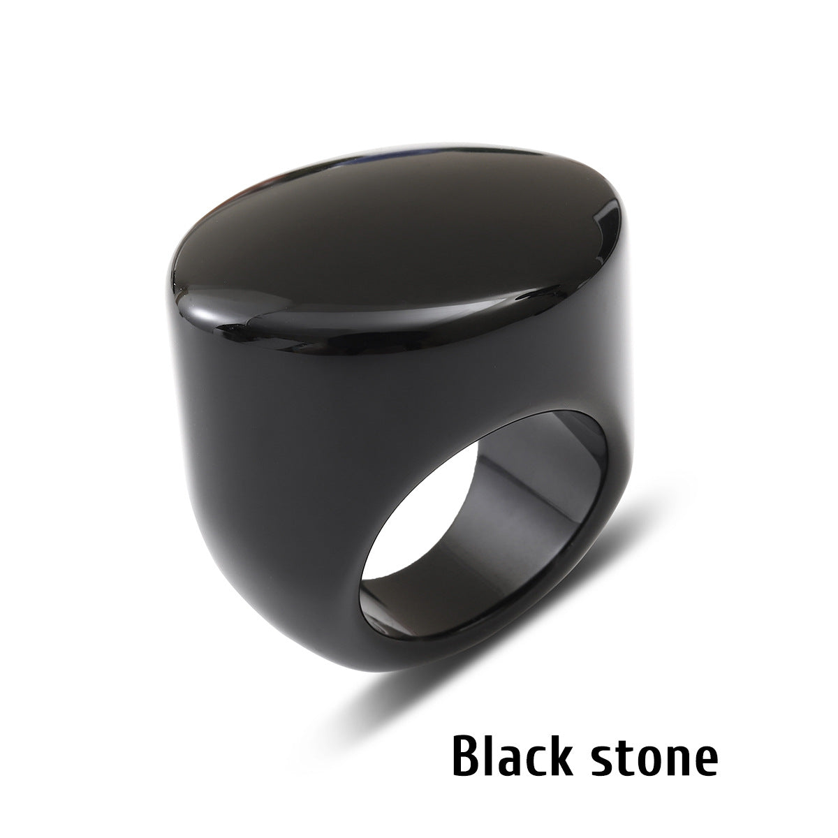 Black stone ring with a flat top face on a white background