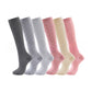 Knee high graduated compression sport socks displayed as a colour assortment