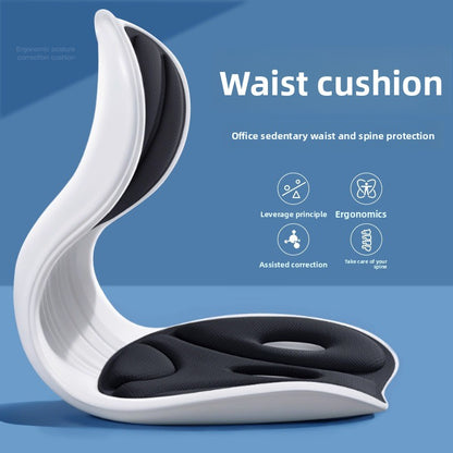 Lumbar support cushion strapped to an office chair behind the lower back