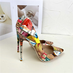Graffiti magazine collage stiletto pump, pointed toe, glossy patent look PU, side profile view