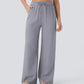 Linen yoga pants shown in use during a gentle stretch