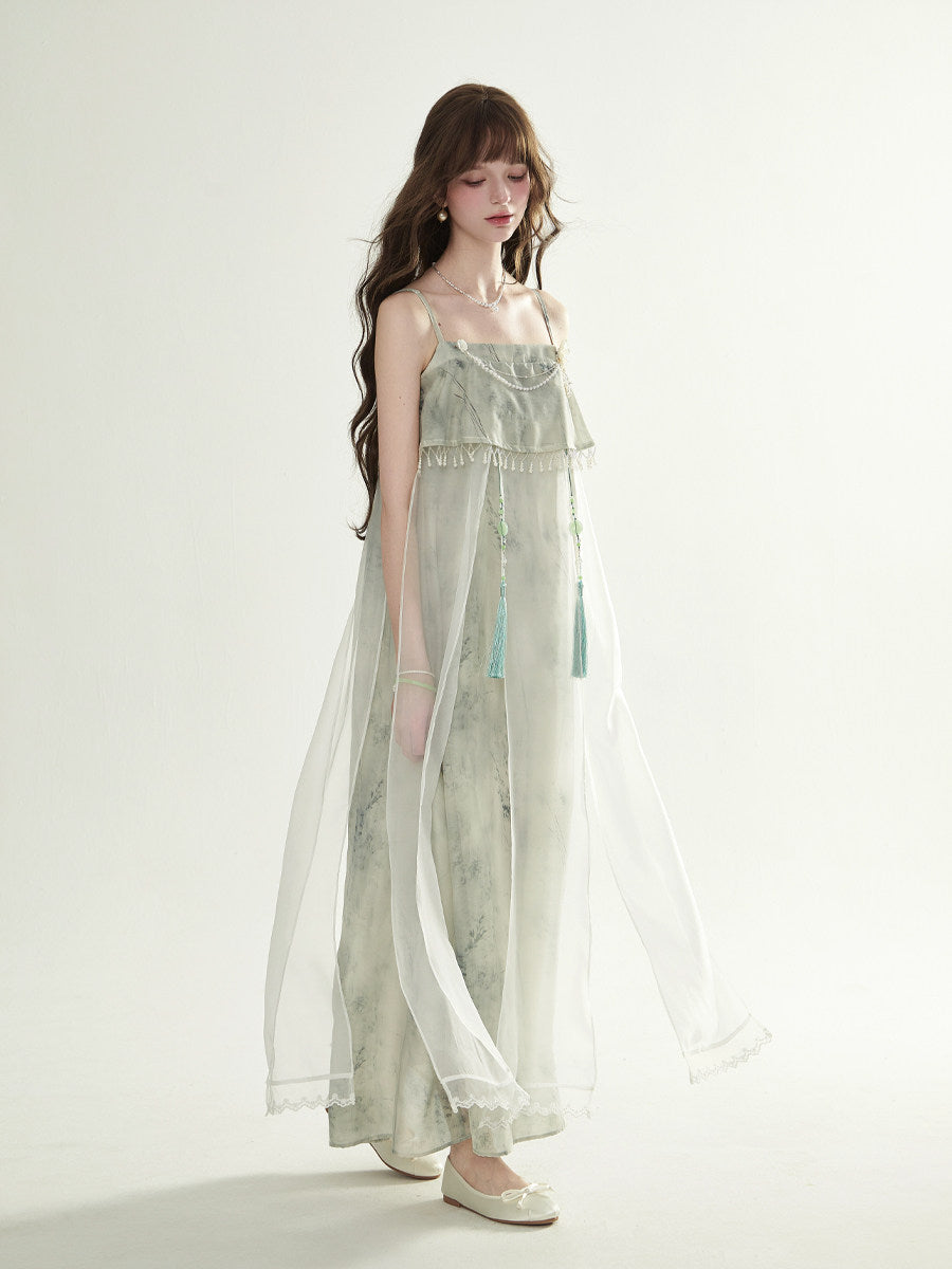 Three-quarter view of the long gauze skirt mid-step