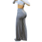 Grey high-waist wide-leg yoga pants studio side view showing the contoured back yoke seam
