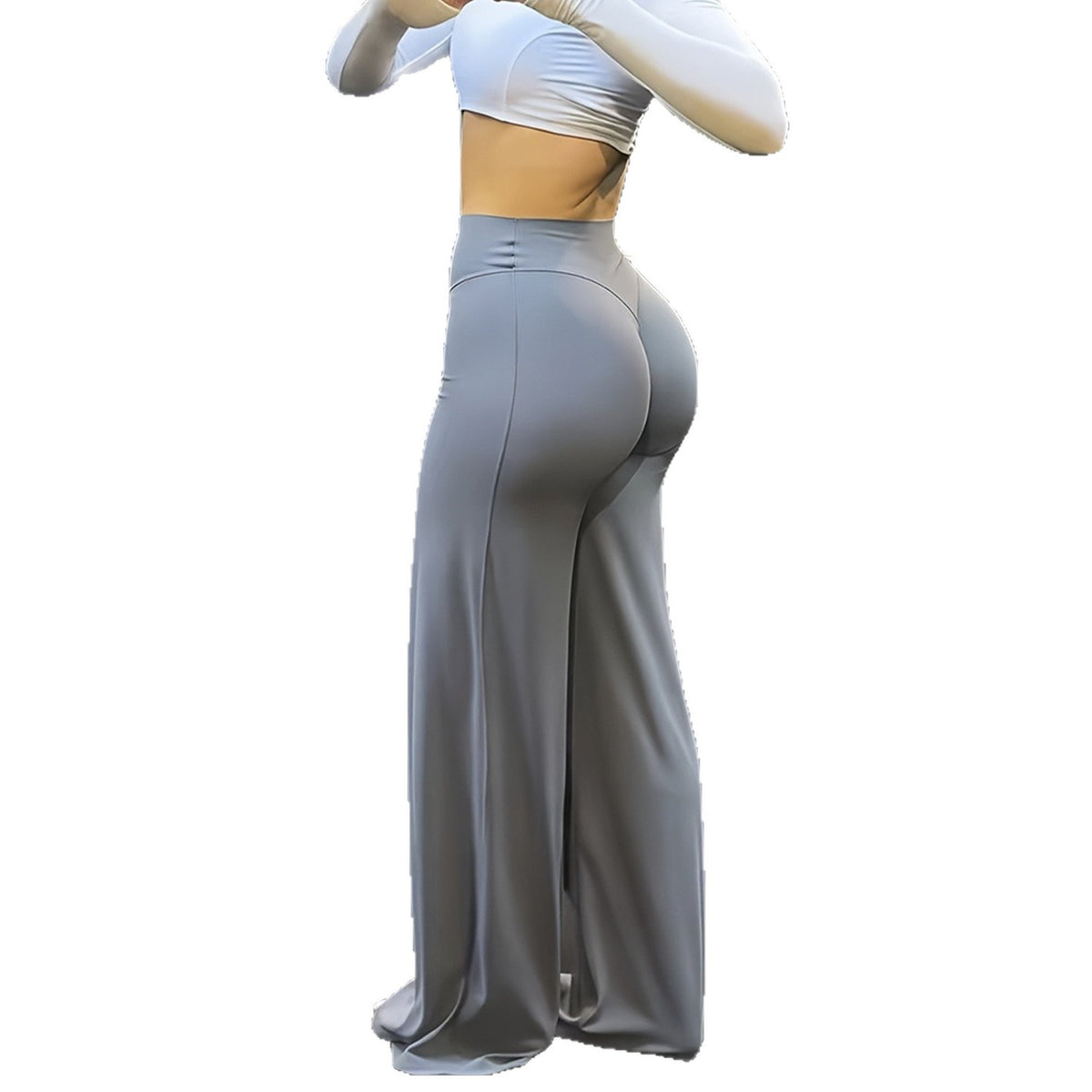 Grey high-waist wide-leg yoga pants studio side view showing the contoured back yoke seam