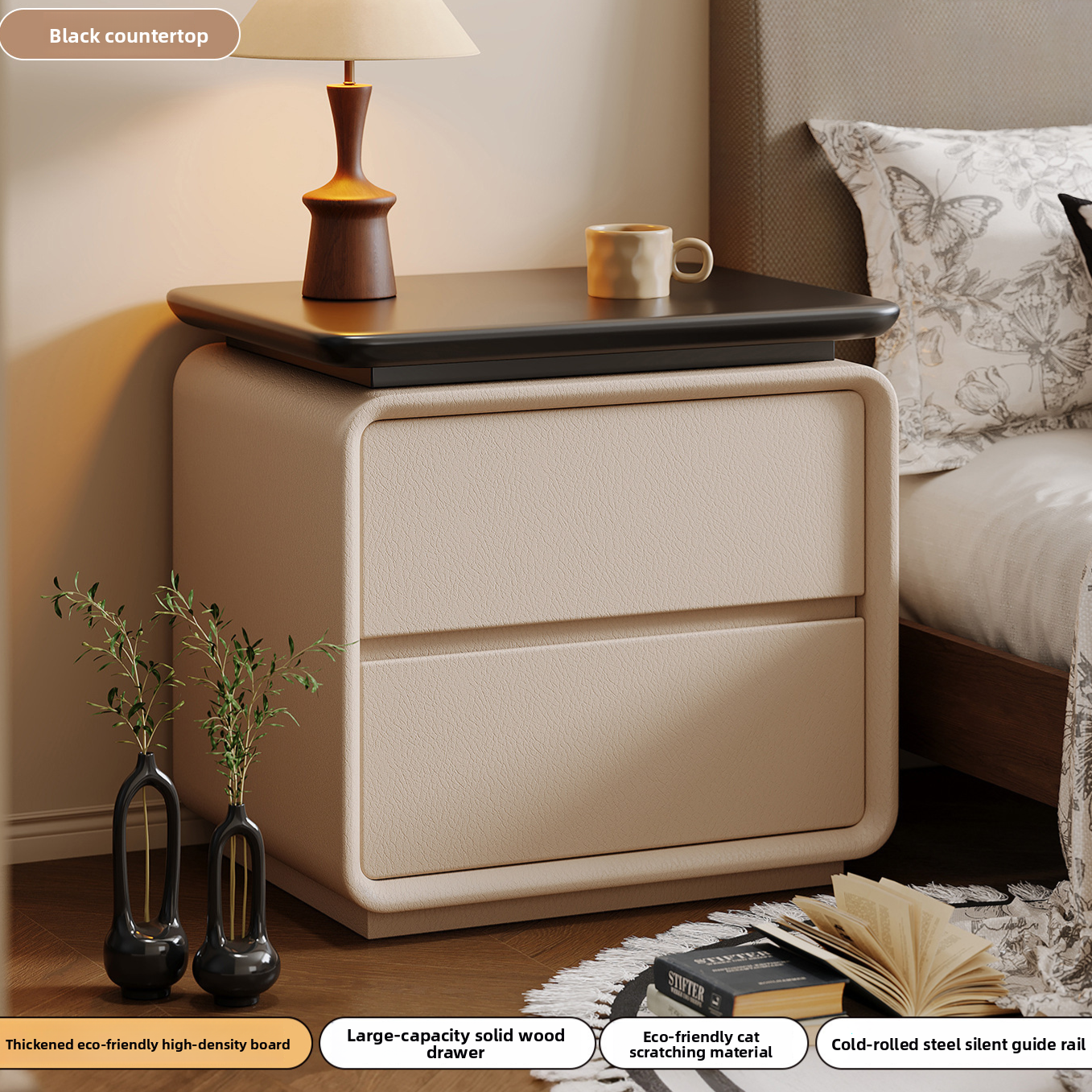Two drawers of the bedside table pulled open to show the storage inside