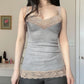 Gray V-neck camisole laid flat showing the lace neckline and slim cut