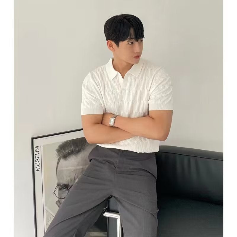 Green knitted short sleeve polo with an open lapel collar on a model