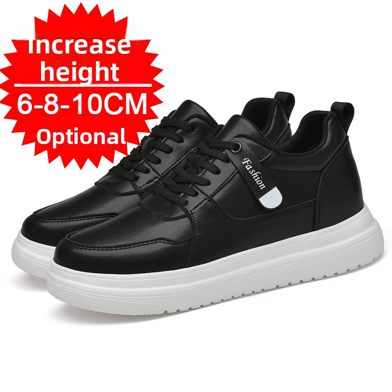 Pair of black low-top sneakers with a Fashion tag strap and a chunky white sole on a white background