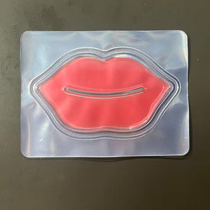 Pink hydrogel jelly lip mask patch shaped like lips, flat lay