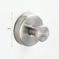 White stainless steel suction cup razor holder mounted on bathroom tile