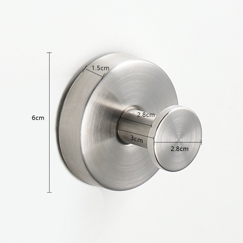 White stainless steel suction cup razor holder mounted on bathroom tile