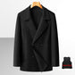 Black double breasted wool overcoat with the removable down vest liner shown in an inset