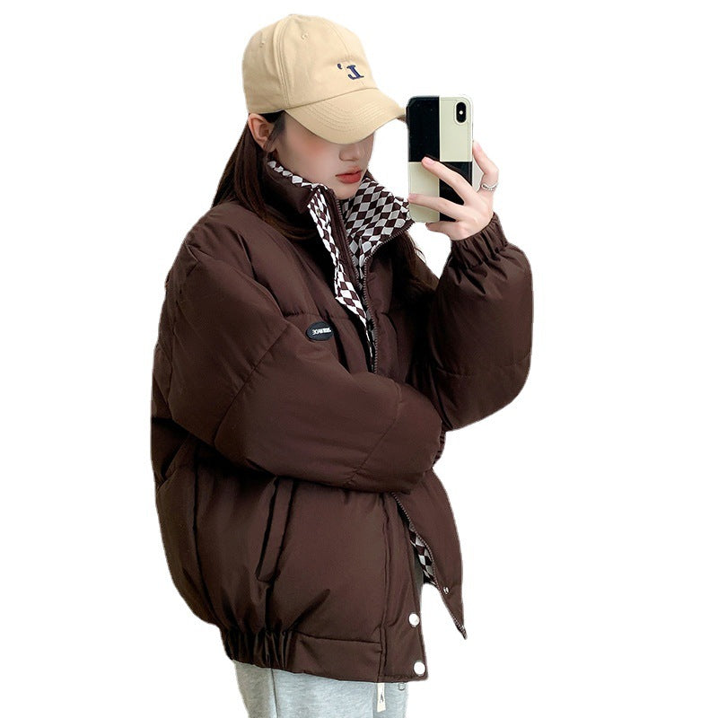 Womens short padded puffer coat, loose fit with stand collar, shown in brown on a model