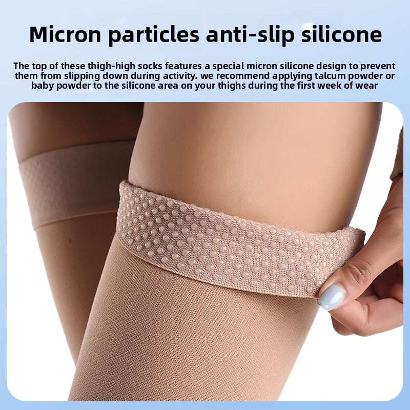 Calf length graduated compression sock in skin tone shown on the lower leg