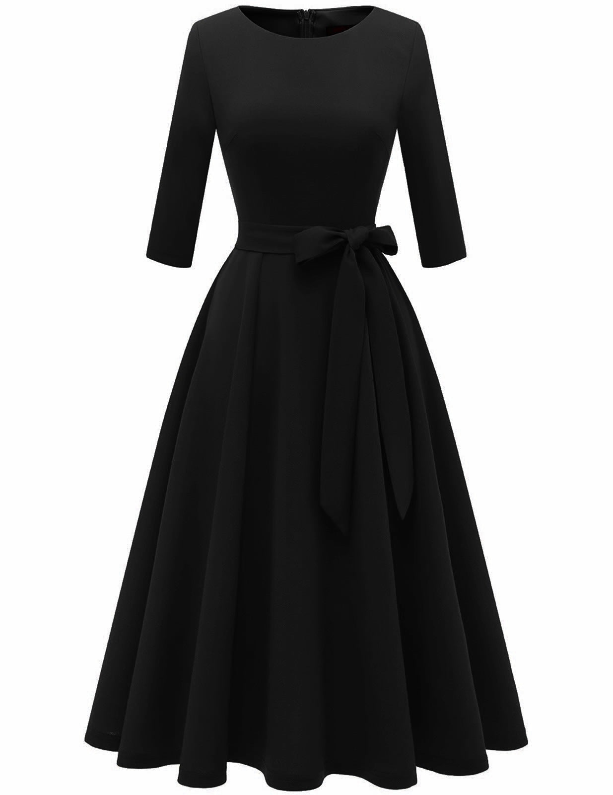 Vintage swing dress worn in a daily occasion moment with the bow belt tied