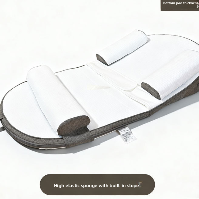 Anti-reflux baby lounger photographed in natural light styling