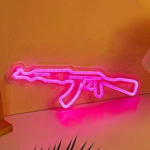 LED neon gaming wall sign lit up on a dark wall