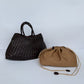 Dark brown woven PU handbag with braided handles beside a tan drawstring pouch