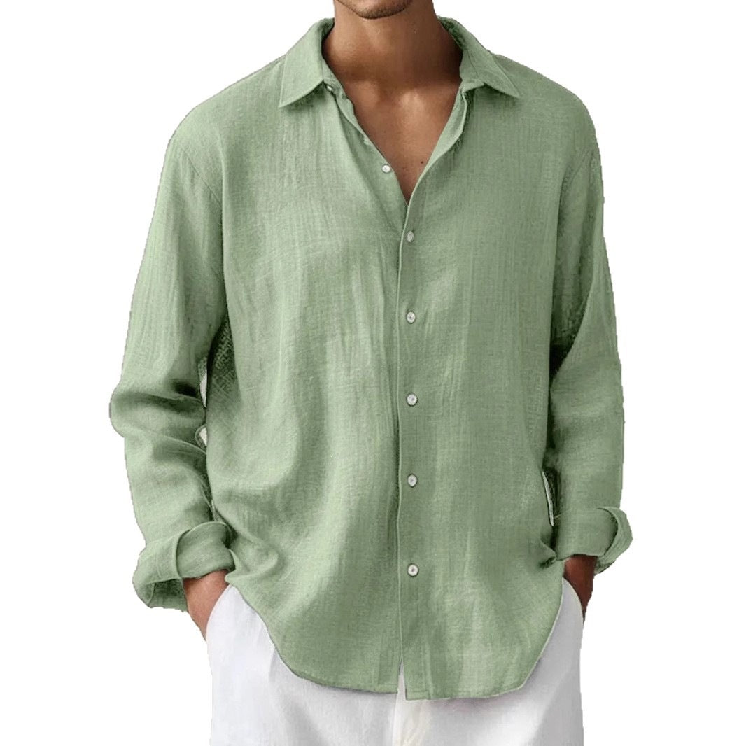Mens long sleeve linen look button up shirt shown on a beach model