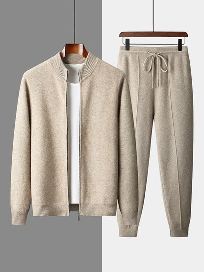 Camel men's knit zip cardigan with ribbed stand collar beside matching drawstring jogger trousers on hangers