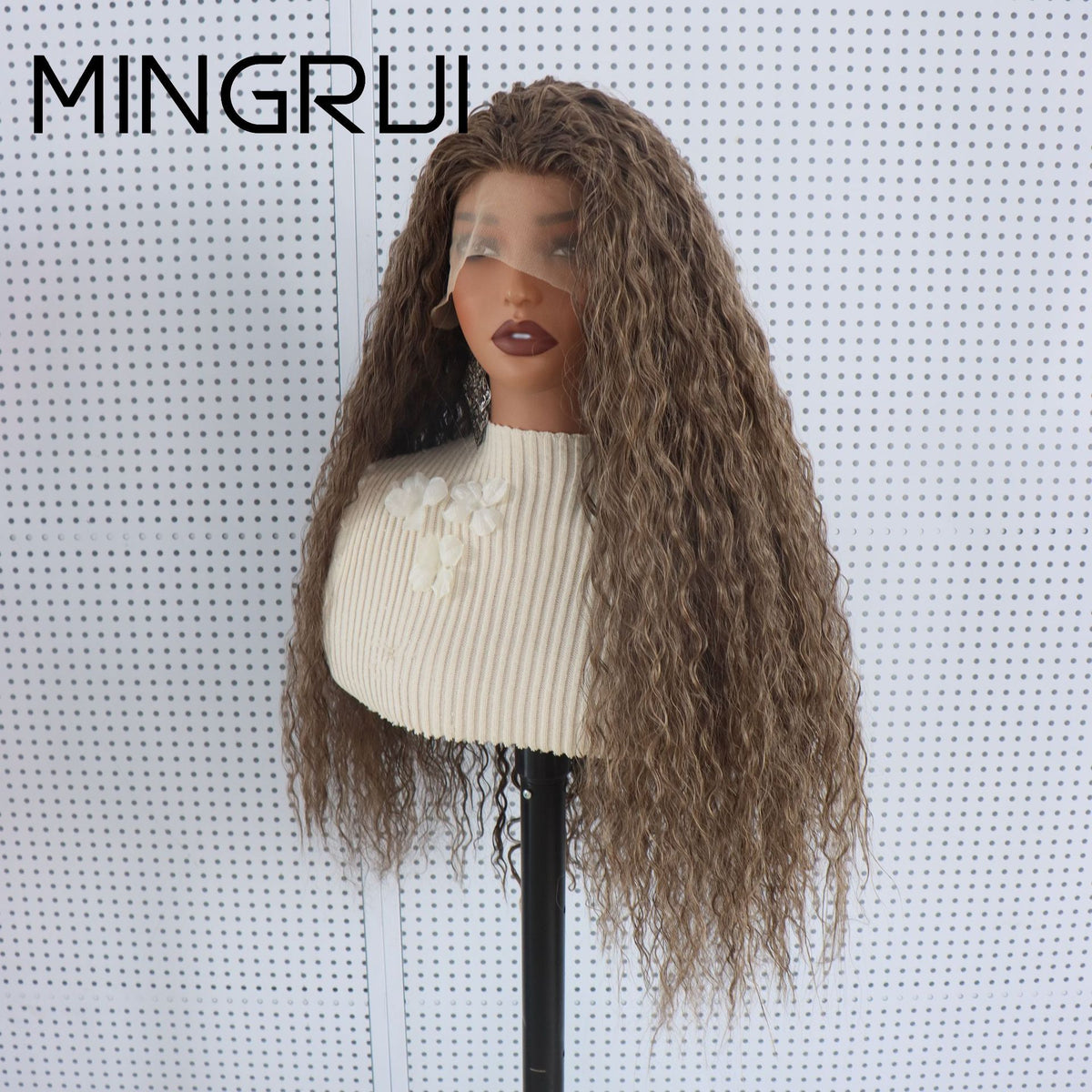 Three quarter view of a long curly brown lace front wig with light highlights on a mannequin