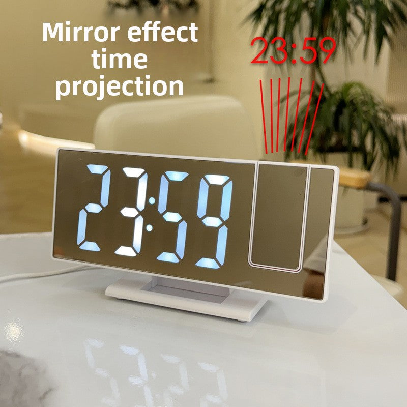 Projector arm on top of the LED clock casting the time onto the ceiling