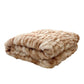 Folded ruched plush blanket on white, tie-dye tan and cream tone, for the Tie-Dye Brown 150x200cm blanket option