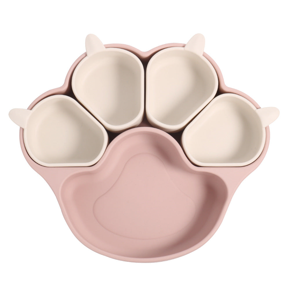 Light pink bear paw plate with four small cream cups on a white background