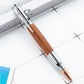 Bolt action ballpoint pen with a turned wood barrel and polished metal bolt mechanism