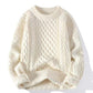 Front view of the cable twist knit crewneck pullover with braided panels down the centre