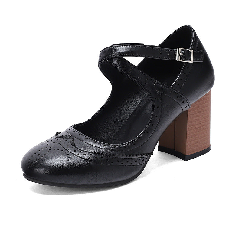 Black brogue Mary Jane block heel pump with cross ankle strap on white, EU size 44 option