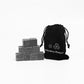 Reusable Whiskey Chilling Stones Set | scale reference next to a hand