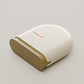 Compact plastic retainer storage case in a soft pastel color, closed