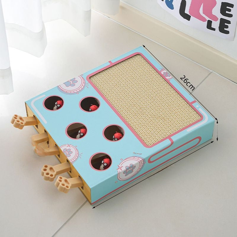 Groundhog cat toy box shown with teaser accessory for interactive whack a mole play with cats
