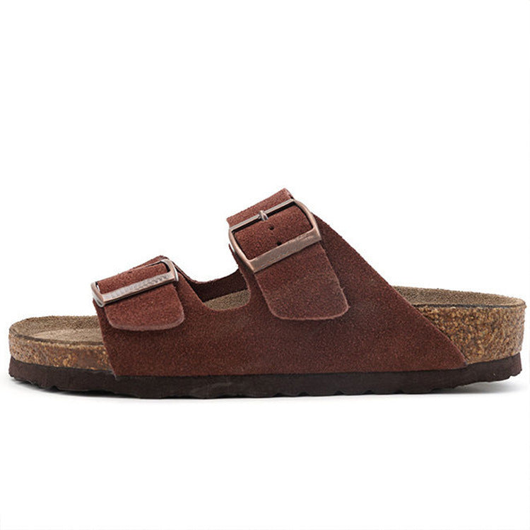 rubber outsole of a pink cork slide sandal seen from below