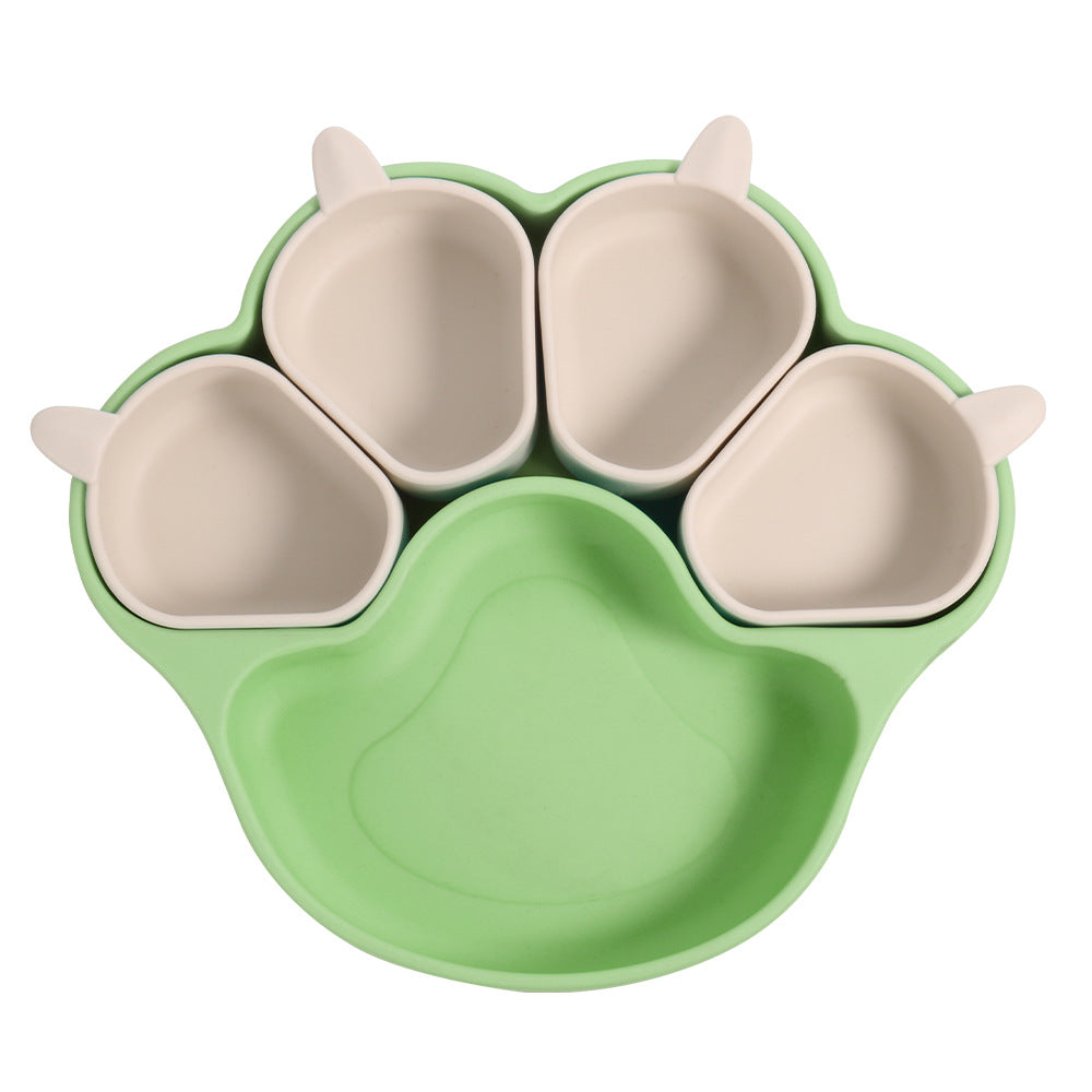 Fresh green bear paw plate with four small beige cups on a white background