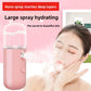 Pink handheld nano facial mister spraying a wide cold mist on a pink background