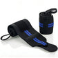 Black and blue elastic wrist wrap pair, one rolled and one flat, on white ground