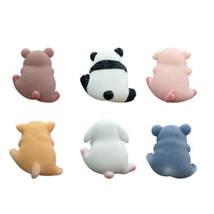 Six resin animal figurines seen from behind on white, bear, panda, pig, shiba, bunny, koala