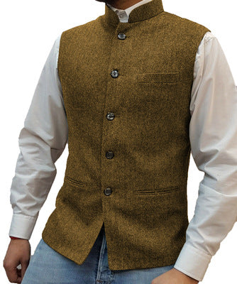 Golden Brown herringbone stand collar vest over a white shirt, size M