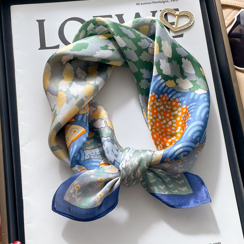 Navy multicolor floral printed square scarf with a satin sheen and hemmed edges, shown displayed