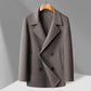 Camel toned double faced wool overcoat shown flat on a hanger, double breasted front view