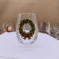 Clear borosilicate Christmas glass cup with a raised painted flat wreath holiday motif