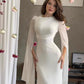 Side angle of the slim-fit dress showing how the line follows the silhouette