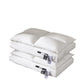 CloudFeel medium loft white microfiber pillow resting on grey bed sheets