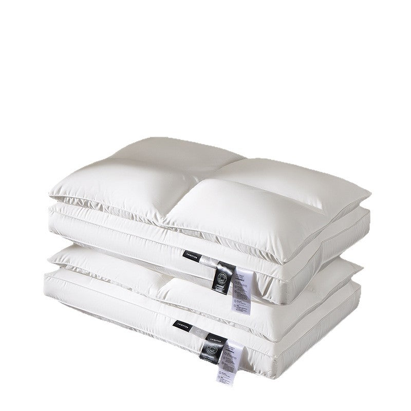 CloudFeel medium loft white microfiber pillow resting on grey bed sheets